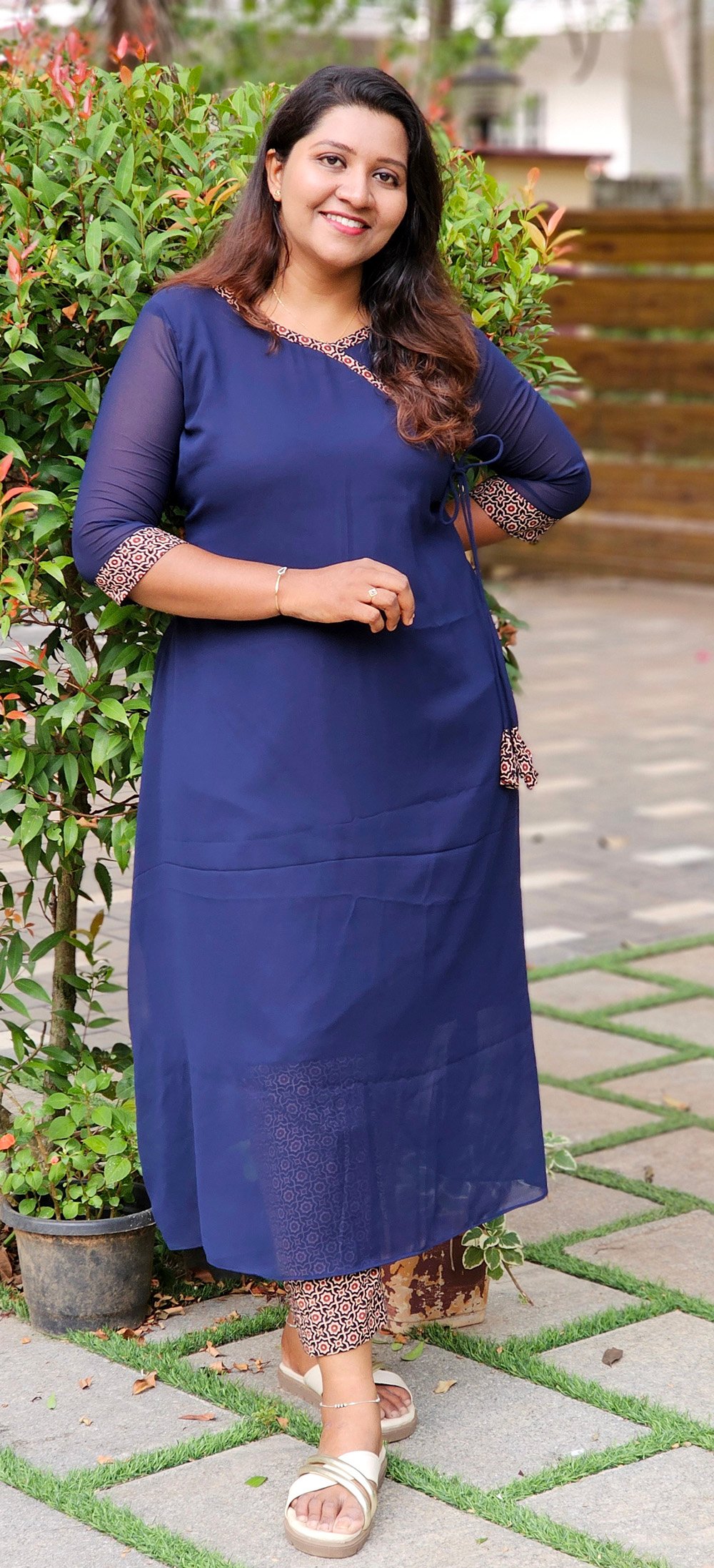 NAVY BLUE GEORGETTE SIDE KNOT TOP WITH AJRAKH BOTTOM Navy Blue Georgette Side Knot Top with Ajrakh Bottom - Image 1