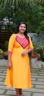 MITHRA YELLOW VICHITHRA SILK MIRROR WORK KURTI